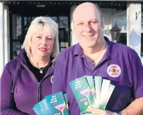  ??  ?? CAMPAIGNER­S Mandy and Colin Mackie with their drink-spiking flyers