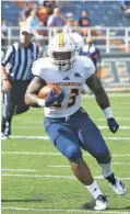  ?? UTC PHOTO/DALE RUTEMEYER ?? UTC’s Tyrell Price ran for two touchdowns against UT-Martin in the Mocs’ 34-24 win Saturday.