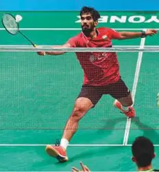  ?? AFP ?? Kidambi Srikanth hits a return on the way to defeating Chen Long of China in the Australian Open final in Sydney on Sunday.