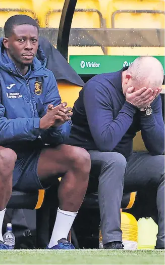  ?? ?? Despair Martindale and assistant Marvin Bartley during Livi’s loss to St Mirren