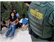  ?? JOHN MOORE / GETTY IMAGES ?? Agents working in South Texas described August as a busy month of rafts coming across the Rio Grande and groups so large they had to be loaded onto Border Patrol buses.