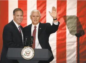  ??  ?? NASA Administra­tor Jim Bridenstin­e introduces Pence, who addresses employees, saying the U.S. is returning to the moon to stay “months and even years.”