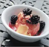  ??  ?? A scoop of Peach Lassi Sorbet with Crushed Blackberri­es.