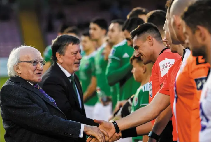  ??  ?? President of Ireland Michael D Higgins greets the players and officials prior to the 2019 President’s Cup Final.