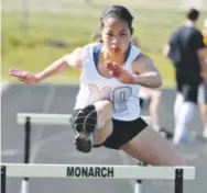  ?? Cliff Grassmick, Daily Camera ?? Carly Donner’s father says she skipped crawling and went straight to her feet, now running the hurdles at Monarch High School.