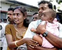  ??  ?? Abilash as a baby with his parents