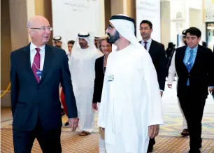  ?? Wam ?? His Highness Sheikh Mohammed bin Rashid Al Maktoum, Vice-President and Prime Minister of the UAE and Ruler of Dubai, with Prof Klaus Schwab before the meeting of Global Future Councils in Dubai on Friday. —