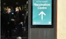  ??  ?? People line up for their Covid-19 vaccine at the vaccinatio­n hub at Sydney Olympic Park. The NSW government will offer two hours of paid vaccine leave for public sector workers. Photograph: Mick Tsikas/AAP