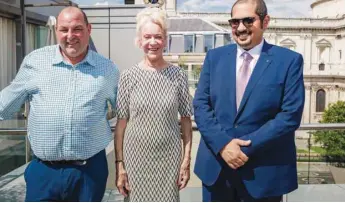  ??  ?? Qatar Racing and Equestrian Club general manager Nasser Sherida al-Kaabi (right) with the owner and trainer of Al Rayyan Stakes winner Tip Two Win, Anne Cowley (centre) and Roger Teal (left).