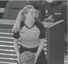  ?? JEFF CHIU/AP ?? Referee Jenna Schroeder during an NBA game between the Warriors and Pacers in 2021.