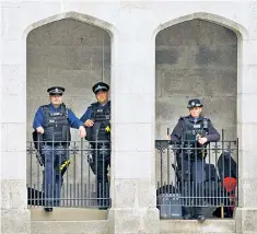  ??  ?? Police in the gate lodge at Balmoral where Privy Counsellor­s sought a prorogatio­n