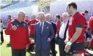  ??  ?? Prince Charles meets the coach, Warren Gatland (left), and the captain, Alun Wyn Jones, at Wales’s training camp in Tokyo. Photograph: David Davies/AP