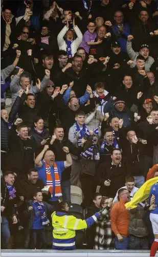  ?? ?? Alfredo Morelos celebrates with the fans on Saturday afternoon following his goal (right) against St Mirren