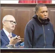  ?? Jefferson Siegel
Associated Press ?? CRAIG WRIGHT, right, another of those charged in the Sept. 29 attack on a driver, stands with his attorney, Mitchell Elman, in a Brooklyn courtroom.