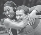  ?? BARBARA J. PERENIC/COLUMBUS DISPATCH ?? Ohoi State coach Kevin Mcguff embraces forward Cotie Mcmahon after beating Uconn in the Sweet 16.