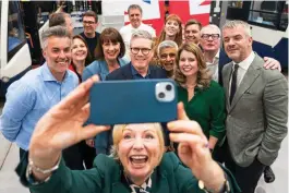  ?? PA ?? The Mayor of West Yorkshire, Tracy Brabin, takes a selfie with Sir Keir Starmer (centre) and Labour’s new team of mayors in Wolverhamp­ton yesterday