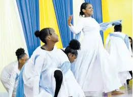  ?? ?? Students perform a dance number during the launch of Merl Grove High School’s centennial on Monday. The celebratio­ns will be held under the theme ‘A Century of Toil and Triumph’.