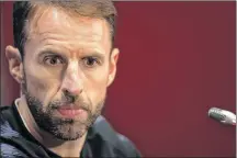  ?? AP PHOTO ?? England head coach Gareth Southgate listens to a question during England’s official news conference on the eve of the semifinal match between England and Croatia at the 2018 soccer World Cup in the Luzhniki stadium in Moscow, Russia, Tuesday.