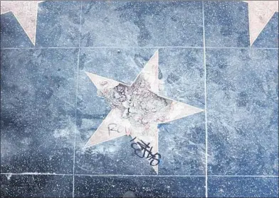  ?? Al Seib Los Angeles Times ?? DONALD TRUMP’S star on the Hollywood Walk of Fame after it was vandalized last week.