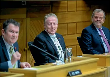  ?? PHOTO: MURRAY WILSON/FAIRFAX NZ ?? Palmerston North City Council retiring chief executive Paddy Clifford at his last council meeting, flanked by mayor Grant Smith, left, and interim successor David Wright.