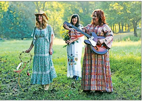  ??  ?? Three notable singers — Mandy McBryde (from left), Bonnie Montgomery and Amy Garland Angel — teamed up as the Wildflower Revue.