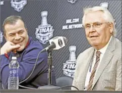  ?? GETTY ?? Glen Sather (r.) shares stage with Alain Vigneault but GM says he has little to do except enjoy games and find good golf course to play.