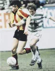  ??  ?? 0 Dalglish tussles with Partick Thistle’s Alan Hansen at Firhill. The two men wouldgoont­o become teammates at Liverpool, helping the Anfield club dominate the English game in the 1970s and 1980s