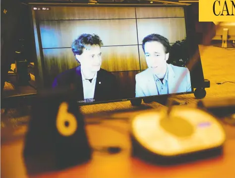  ?? SEAN KILPATRICK/THE CANADIAN PRESS FILES ?? Marc, left, and Craig Kielburger appear as witnesses via video conference during a House of Commons finance committee on July 28.