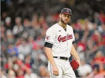  ?? Diamond Images/Diamond Images / Getty Images ?? Lucas Giolito of the Cleveland Guardians exits the game during the fourth inning against the Cincinnati Reds on Sept. 26 in Cleveland, Ohio.