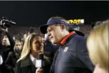  ?? BRYNN ANDERSON — THE ASSOCIATED PRESS ?? Head coach Gus Malzahn is interviewe­d after Auburn’s 2614 victory over Alabama in the Iron Bowl last Saturday.