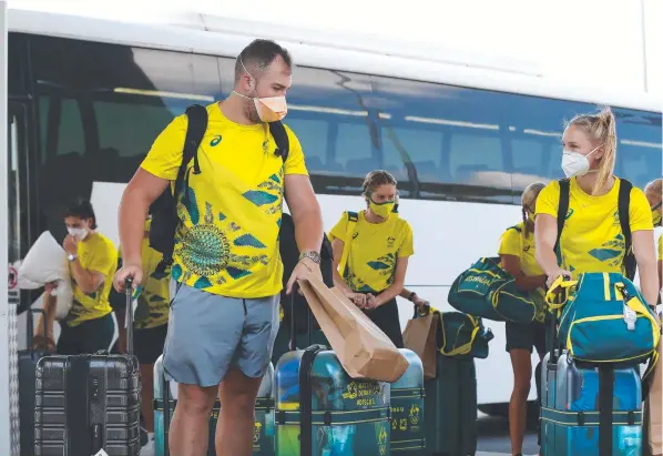  ??  ?? Discus thrower Matt Denny among the first group of Australian Athletics team members to depart Cairns for Tokyo. Pictures: Brendan Radke