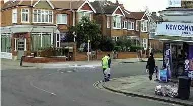  ??  ?? ABOVE: The moment a huge block of ice crashed down on a London street, narrowly missing Serhiy Mysehkov, captured on CCTV.