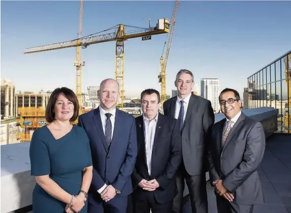  ?? Matthew Horwood ?? > At the launch of the Business Improvemen­t District for Cardiff are Maria Fagan, Hilton Hotel and BID vice chair, Simon Phillips, M&S and BID chair, Martyn Phillips, chief executive WRU, Adrian Field, BID executive director and Mo Aswat, Mosaic...