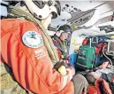  ?? ?? Life-saving SCAA paramedics Wendy Jubb, left, and Julia
Barnes pictured at work on Helimed 76