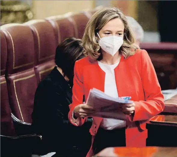  ??  ?? La vicepresid­enta segunda y ministra de Asuntos Económicos, Nadia Calviño, en el último pleno del Congreso