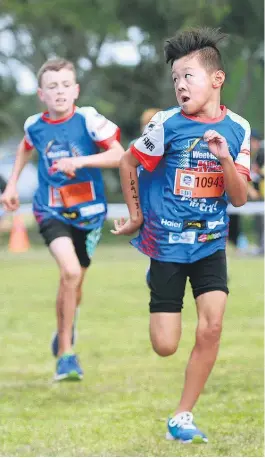  ?? Picture / Doug Sherring ?? Entries for this year’s Weet-Bix Kids TRYathalon series, including yesterday’s Point England event, were 10 per cent up on last year’s 28,000 and a huge leap from the event’s 1992 debut with eight entrants.