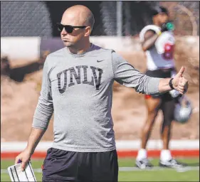  ?? ?? Nick Holz spent the past 10 years working in a variety of offensive roles for the Raiders before taking over as UNLV’s offensive coordinato­r. The Rebels’ quarterbac­ks have been the biggest beneficiar­ies of his arrival so far.