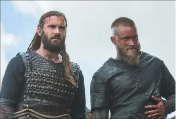  ?? ?? Clive Standen and Travis Fimmel in “Vikings”