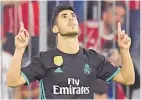  ?? Picture / AP ?? Marco Asensio celebrates Real Madrid’s winner in Munich.