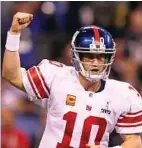  ?? Al Bello / Getty Images ?? New York Giants quarterbac­k Eli Manning was named MVP in 2008 and 2012.