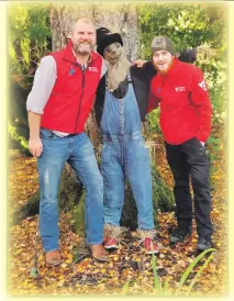  ??  ?? No_B42castle0­1 Right: Operations manager at Brodick Castle Jared Bowers and Laurence Huddleston­e are pictured with a scarecrow which will be transforme­d into something far scarier over the following few days.