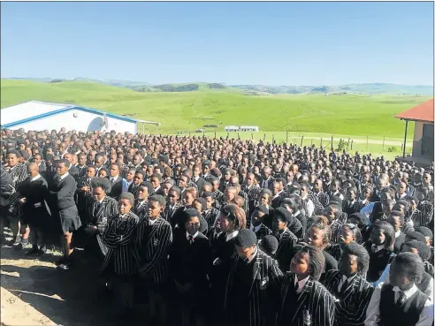  ?? Pictures: LULAMILE FENI ?? PATIENT AND POLITE: Toli High School pupils line up for their assembly