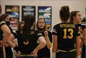  ?? PAUL DICICCO — FOR THE NEWS-HERALD ?? Riverside volleyball coach Ali Vires talks to her team during it’s Division I sectional final win over South on Oct. 24. The Beavers play at Green in a district final on Oct. 31.