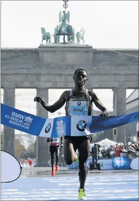  ?? Picture: REUTERS ?? CHAMPION: Ethiopia’s Kenenisa Bekele wins Sunday’s Berlin Marathon in the second fastest time in history ahead of Kenya’s Wilson Kipsang in the background.