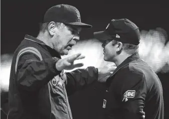  ?? Scott Strazzante / San Francisco Chronicle ?? The Giants’ Bruce Bochy, left, won’t be arguing with umpires much longer after announcing that he will retire after this season — his 25th as a big league manager.