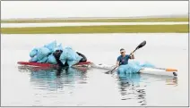  ??  ?? RAISING AWARENESS: Dean Horne, of the Bluewater Bay Surf Lifesaving and Canoeing Club, helps with one of the regular clean-ups on the Swartkops Estuary led by the Zwartkops Conservanc­y