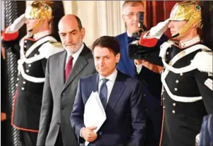  ?? VINCENZO PINTO/AFP ?? Italian lawyer Giuseppe Conte leaves after a meeting with Italy’s President Sergio Mattarella on Wednesday at the Quirinale presidenti­al palace in Rome.