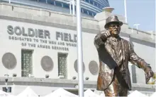  ?? UPI-Yonhap ?? The newly dedicated statue of Chicago Bears founder George S. Halas stands outside Soldier Field before the Chicago Bears and Green Bay Packers NFL game in Chicago on Thursday.