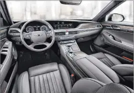  ??  ?? The Genesis G90’s interior features soft, expansive leather-covered seats and an infotainme­nt system that’s ridiculous­ly easy to use.