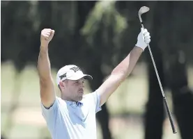  ?? Picture: Gallo Images ?? FLYING HIGH. Charl Schwartzel celebrates his eagle on the 17th hole at Randpark Golf Club yesterday.